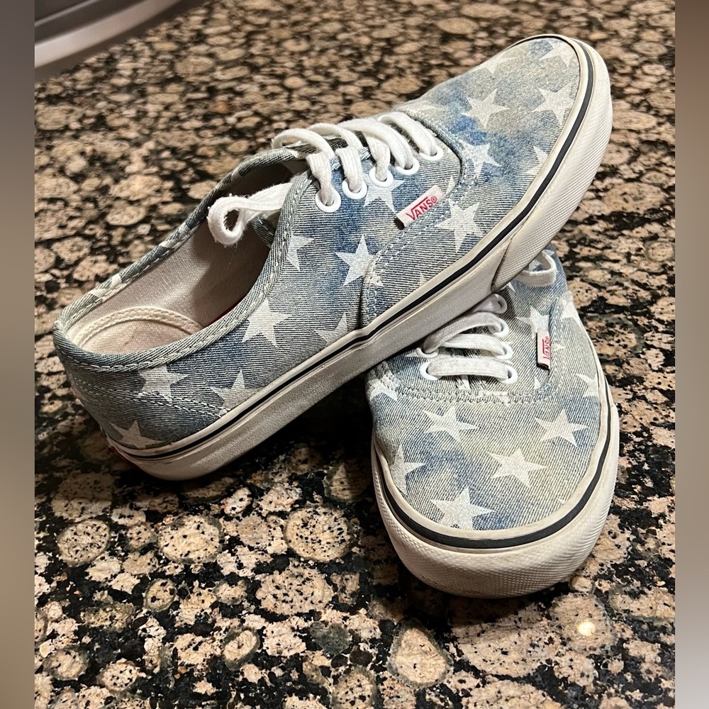 Light blue distressed with star vans. Gently used. Full of life.